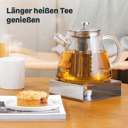 Teekanne aus Glas mit Stövchen